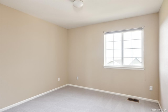 spare room with carpet flooring