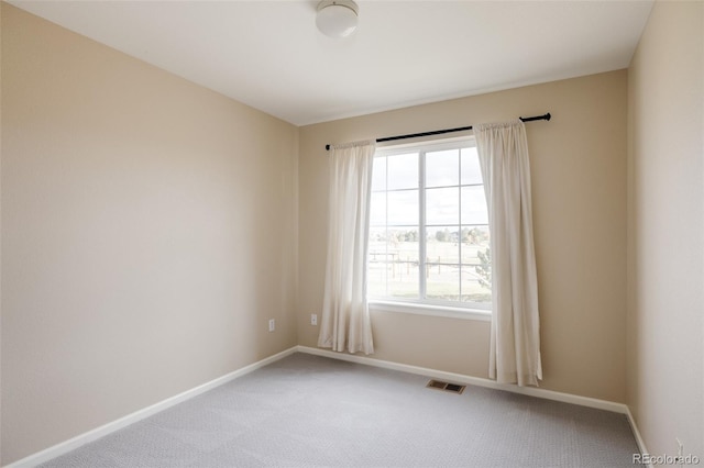 view of carpeted spare room