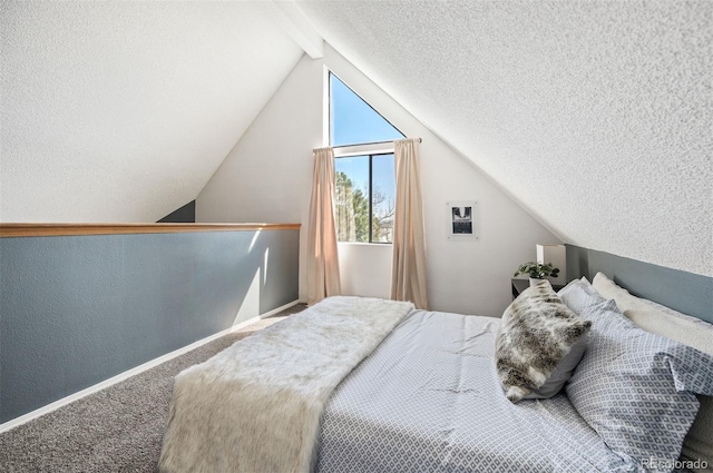 bedroom featuring vaulted ceiling with beams, baseboards, carpet, a textured wall, and a textured ceiling