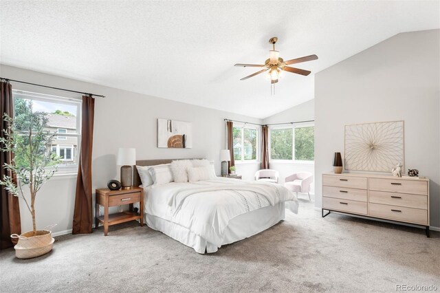 8288 W Chestnut Ave, Littleton, CO 80128 - bedroom with lofted ceiling, light carpet, and a ceiling fan