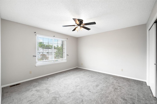 8288 W Chestnut Ave, Littleton, CO 80128 - carpeted spare room with a ceiling fan and a textured ceiling