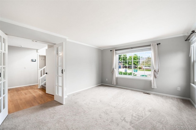 8288 W Chestnut Ave, Littleton, CO 80128 - unfurnished room with french doors, carpet floors, ornamental molding, and stairs