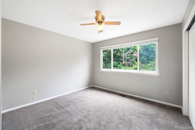 8288 W Chestnut Ave, Littleton, CO 80128 - carpeted spare room with a ceiling fan and a textured ceiling