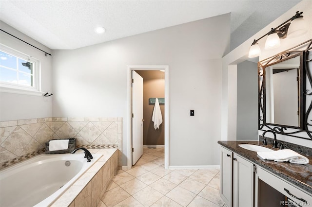 8288 W Chestnut Ave, Littleton, CO 80128 - full bathroom with vanity, a bath, a textured ceiling, and recessed lighting