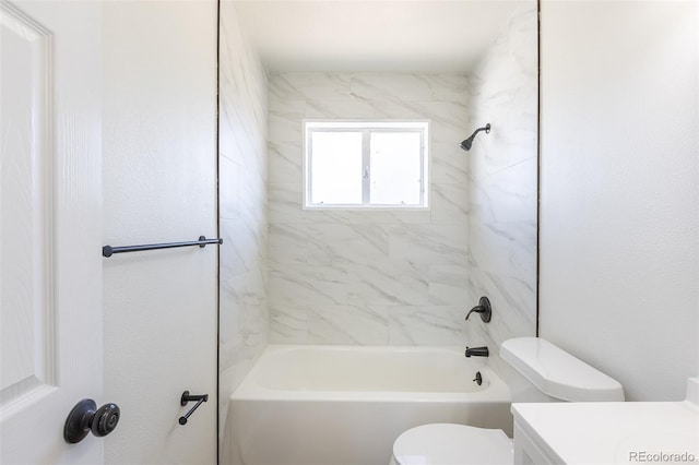 bathroom with vanity, toilet, and tub / shower combination