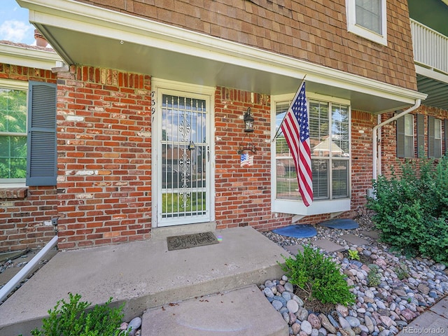 7391 S Knolls Way, Centennial, CO 80122 - property entrance featuring brick siding