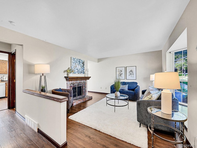 7391 S Knolls Way, Centennial, CO 80122 - living area with wood finished floors and a fireplace