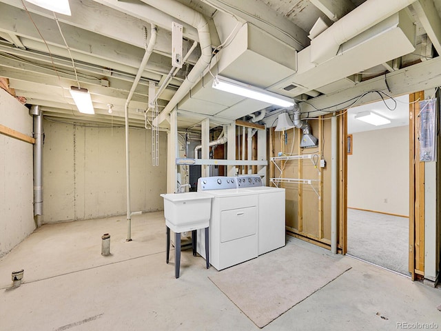 7391 S Knolls Way, Centennial, CO 80122 - unfinished basement featuring washer and clothes dryer