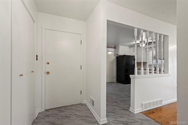 343 Melody Dr, Northglenn, CO 80260 - entryway featuring visible vents and baseboards