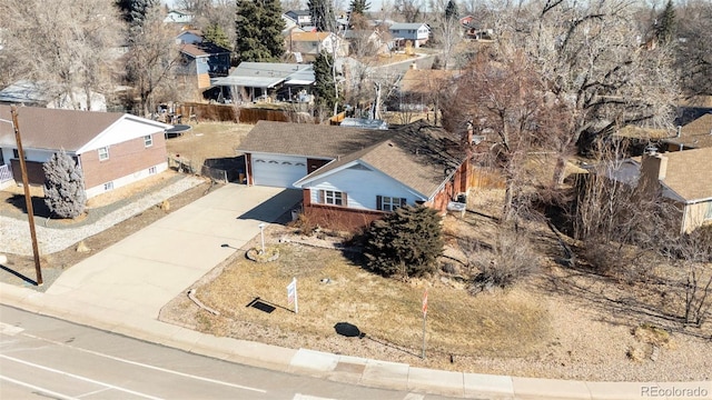 343 Melody Dr, Northglenn, CO 80260 - drone / aerial view with a residential view