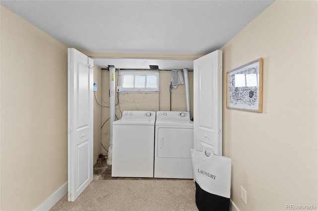 laundry area featuring washer and clothes dryer