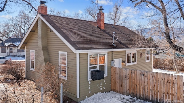 view of snow covered property