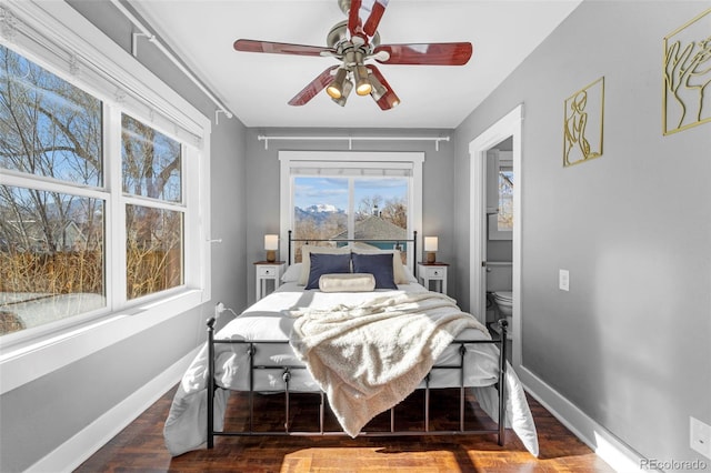 bedroom with ceiling fan and hardwood / wood-style floors