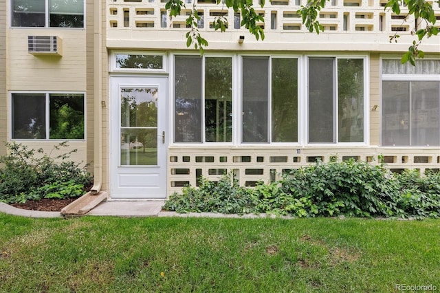 650 S Alton Way Unit 10A, Denver, CO 80247 - doorway to property with a lawn