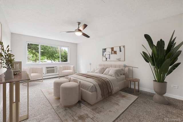 650 S Alton Way Unit 10A, Denver, CO 80247 - carpeted bedroom with a textured ceiling, a wall unit AC, ceiling fan, and baseboards