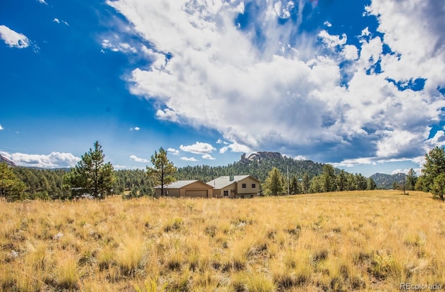 property view of mountains with a rural view