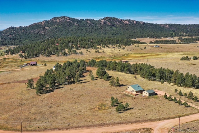 aerial view featuring a rural view and a mountain view