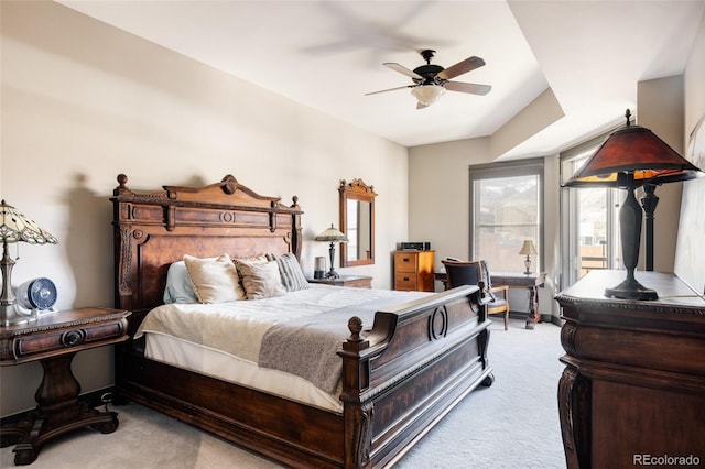 carpeted bedroom with a ceiling fan