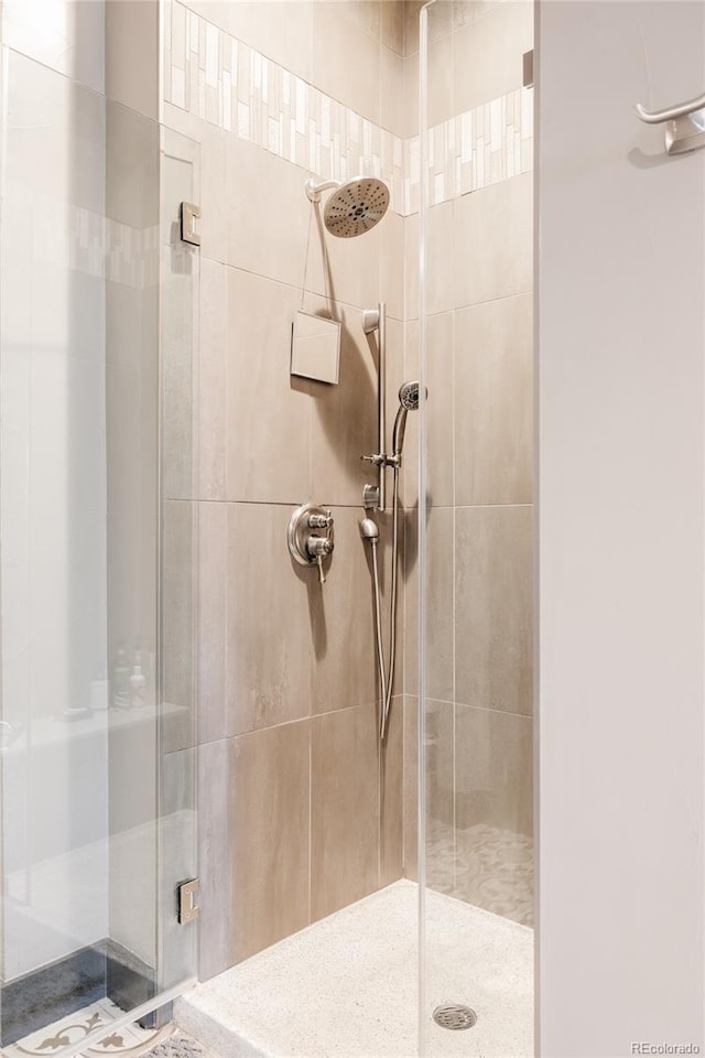 bathroom with a stall shower