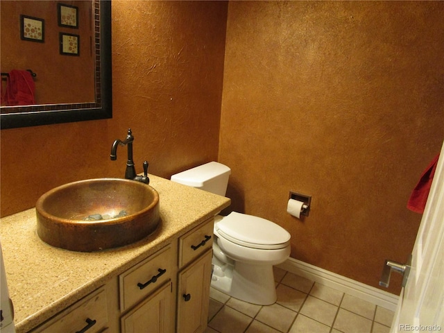 10522 Stoneflower Dr, Parker, CO 80134 - bathroom with tile patterned flooring, toilet, a textured wall, and vanity
