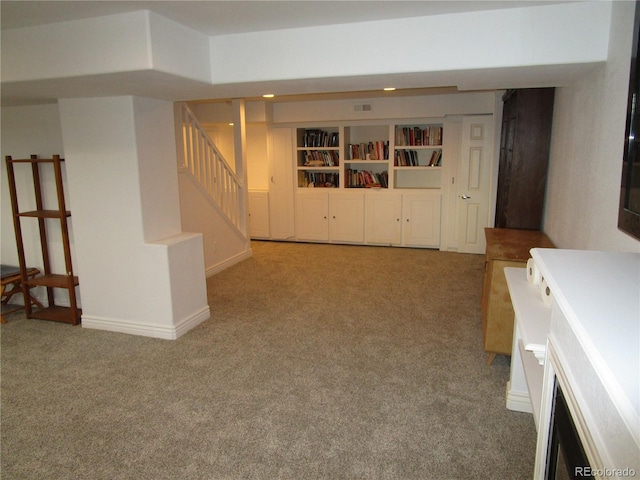 10522 Stoneflower Dr, Parker, CO 80134 - finished basement with carpet flooring, stairs, and baseboards