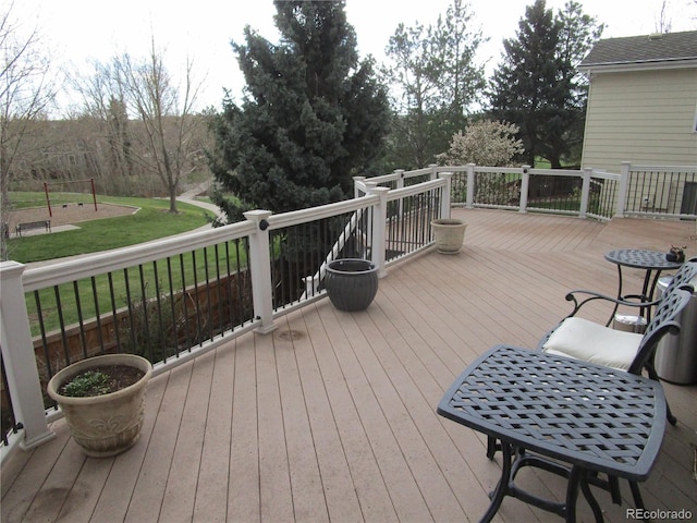 10522 Stoneflower Dr, Parker, CO 80134 - wooden deck with a yard