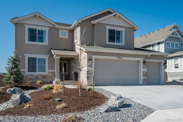 10024 Waterton Canyon Way, Colorado Springs, CO 80924 - craftsman inspired home featuring an attached garage, driveway, stucco siding, and stone siding