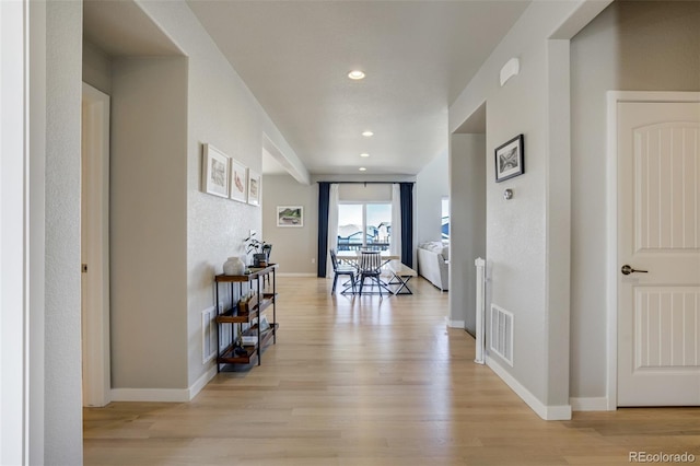 10024 Waterton Canyon Way, Colorado Springs, CO 80924 - corridor with visible vents, baseboards, light wood finished floors, and recessed lighting