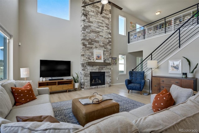 10024 Waterton Canyon Way, Colorado Springs, CO 80924 - living area with plenty of natural light, a high ceiling, and a ceiling fan