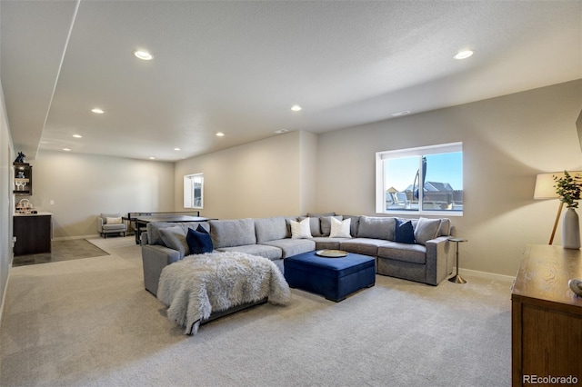 10024 Waterton Canyon Way, Colorado Springs, CO 80924 - living area with light carpet, baseboards, and recessed lighting