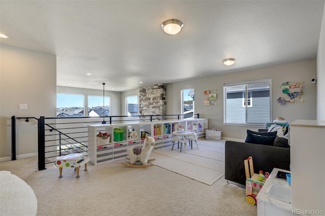 10024 Waterton Canyon Way, Colorado Springs, CO 80924 - carpeted living area with a wealth of natural light, recessed lighting, and baseboards