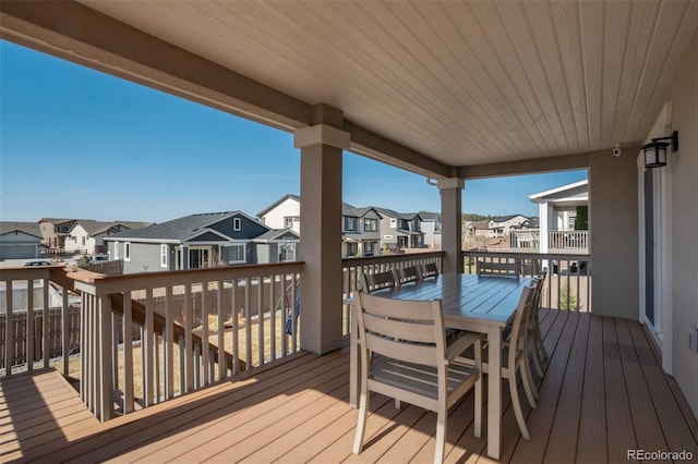 10024 Waterton Canyon Way, Colorado Springs, CO 80924 - wooden deck featuring outdoor dining space and a residential view