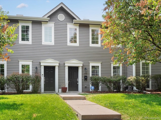 view of front facade with a front lawn