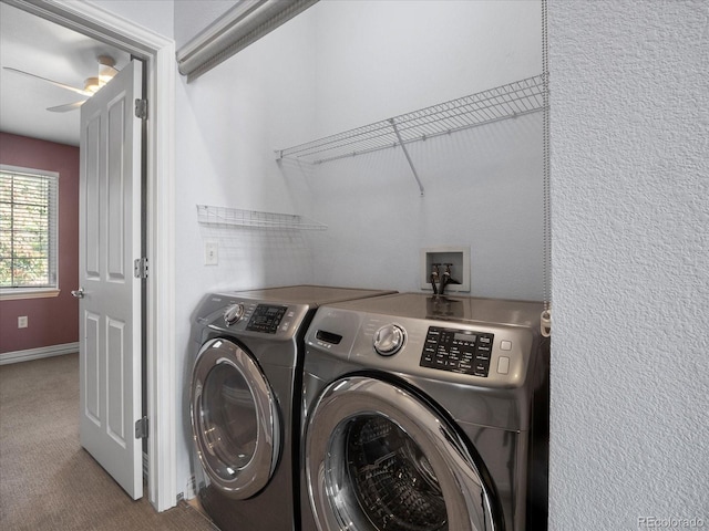 laundry room with ceiling fan, carpet floors, and washer and clothes dryer