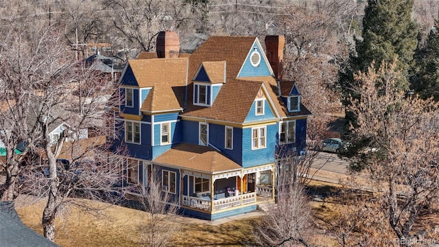 view of front of property featuring a chimney