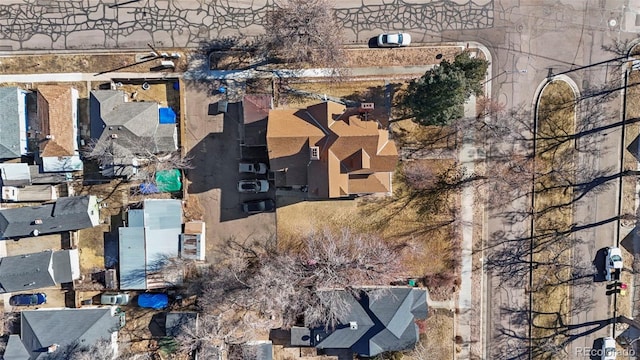 birds eye view of property with a residential view