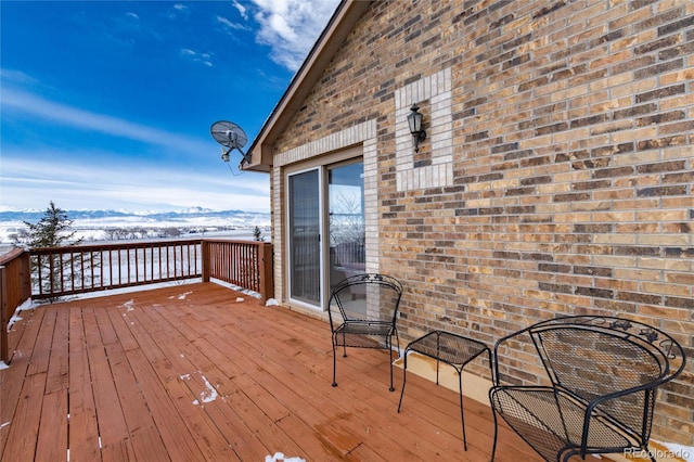view of snow covered deck
