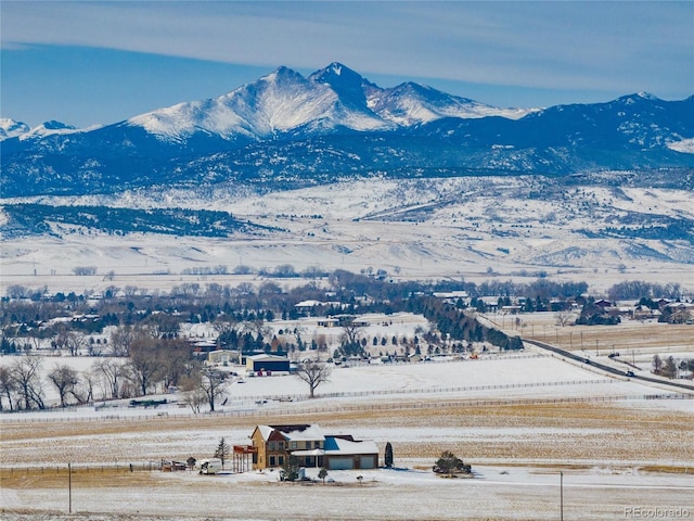 mountain view featuring a rural view