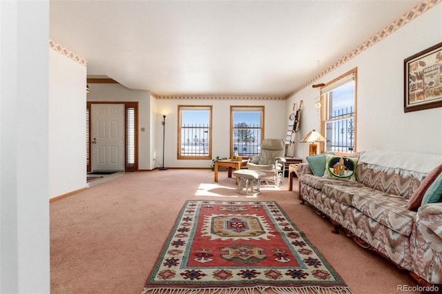 carpeted living room with baseboards