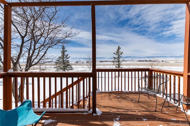 view of snow covered deck