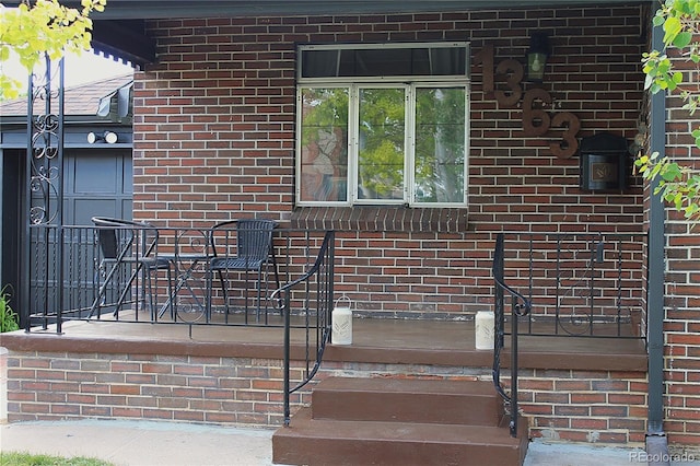 1363 Stuart St, Denver, CO 80204 - property entrance featuring brick siding