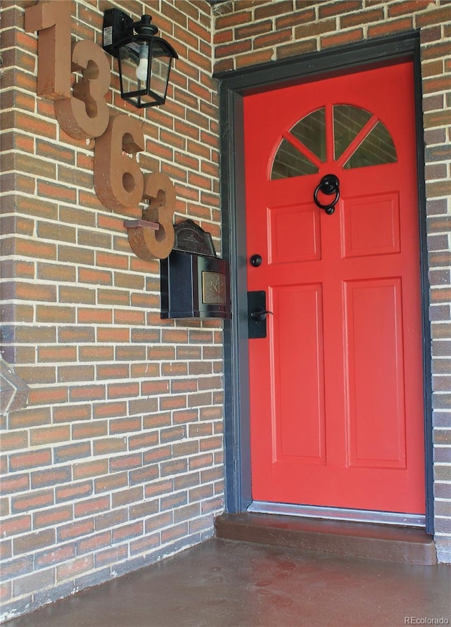 1363 Stuart St, Denver, CO 80204 - view of exterior entry with brick siding