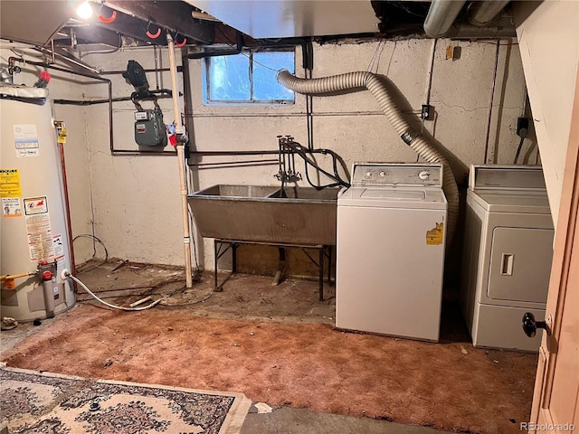 laundry area with separate washer and dryer, sink, and water heater