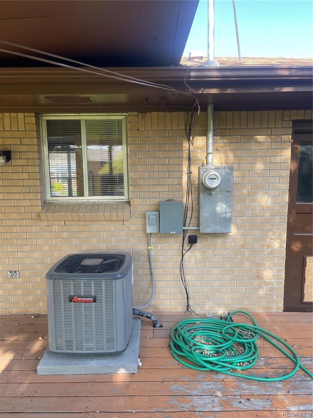 6139 S Adams Dr, Centennial, CO 80121 - exterior view of a cooling unit and brick siding