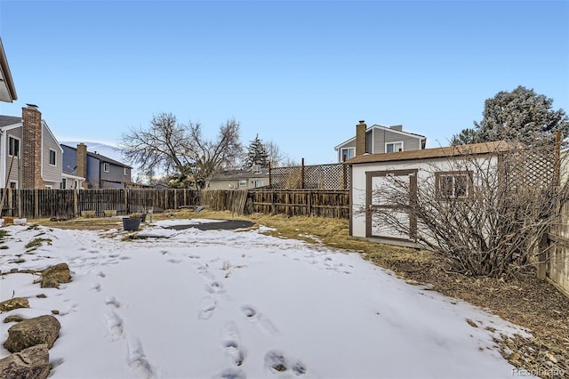 view of yard covered in snow