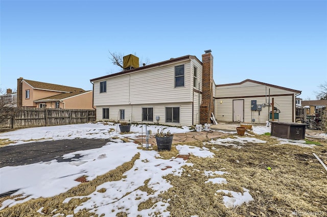 view of snow covered house