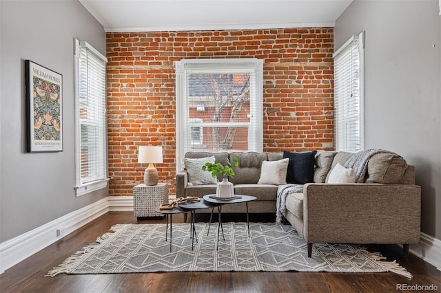 321 S Emerson St, Denver, CO 80209 - living area featuring brick wall, plenty of natural light, baseboards, and wood finished floors