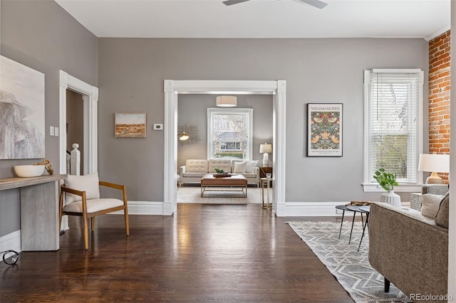 321 S Emerson St, Denver, CO 80209 - sitting room with plenty of natural light, dark wood-style floors, baseboards, and ceiling fan