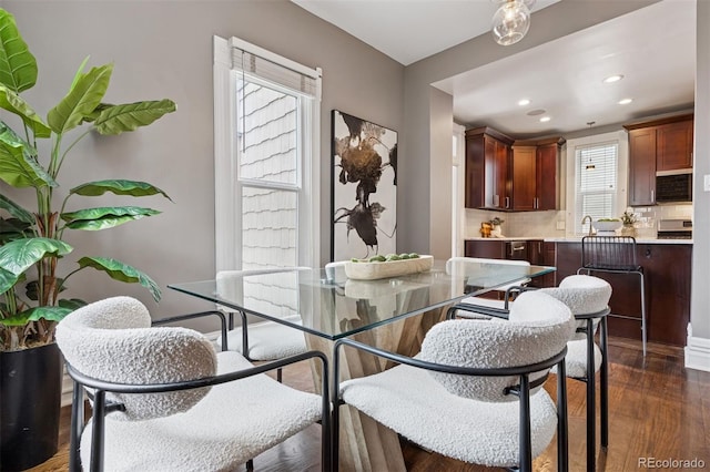 321 S Emerson St, Denver, CO 80209 - dining room with recessed lighting and dark wood-style flooring