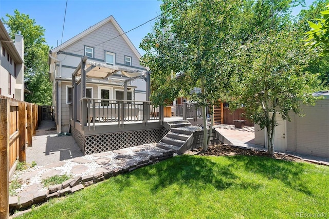 321 S Emerson St, Denver, CO 80209 - back of property with a wooden deck and a pergola